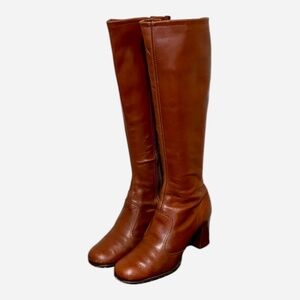 Size 7 Vintage tall rusk colored genuine leather women 1970s zip up Go Go Boots.